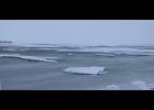 Photo by Diana Haecker OPEN WATER— The storms broke up ice and left the mouth of the Nome River with ice floes bobbing in open water.