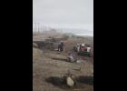 Photo by Diana Haecker Beach miners began digging for gold-laden sands in the newly exposed, eroded parts of beaches at Nome, including the road bed of the Nome Council Road and Native allotments.